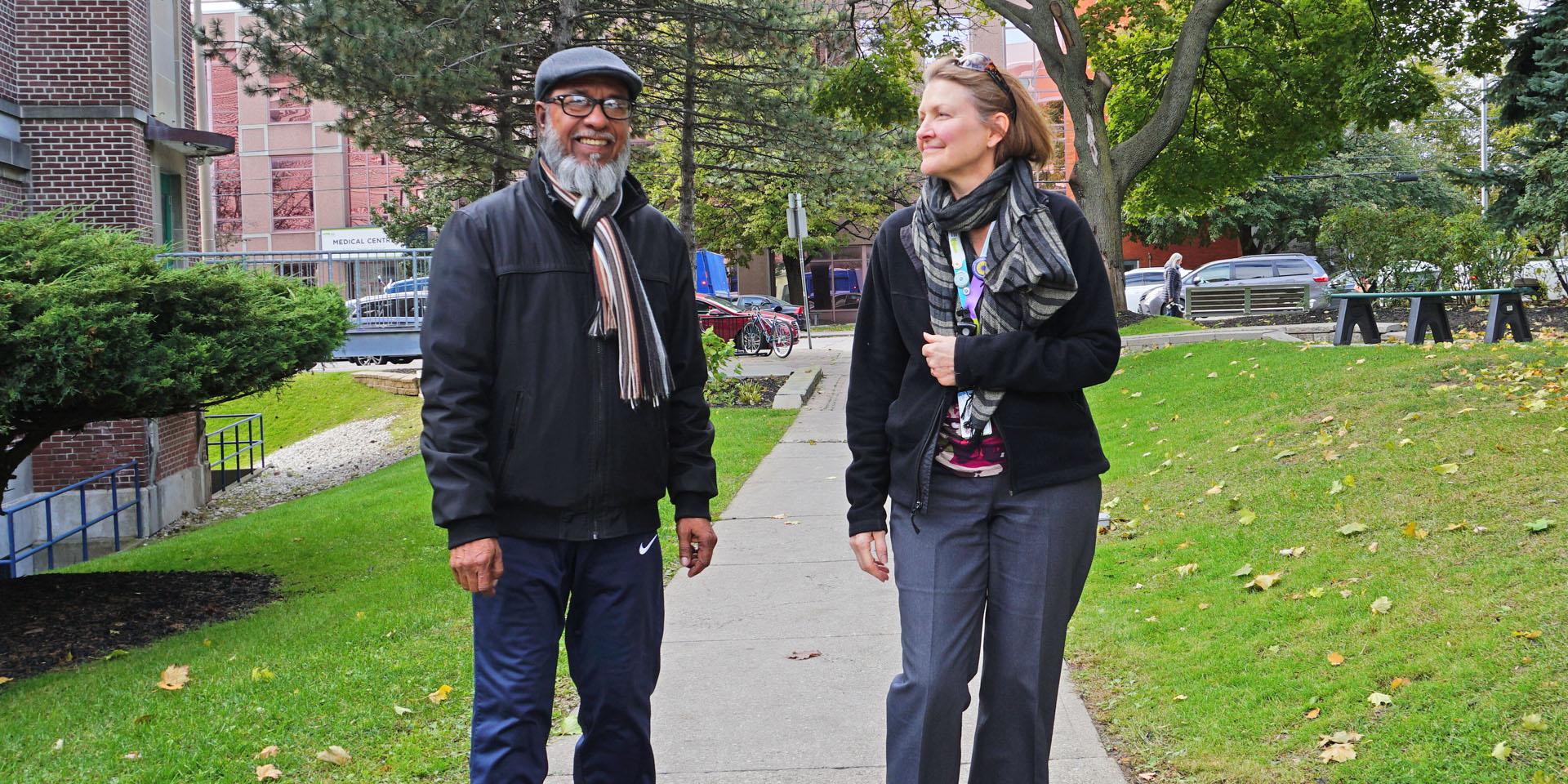 Man and woman walking together and talking