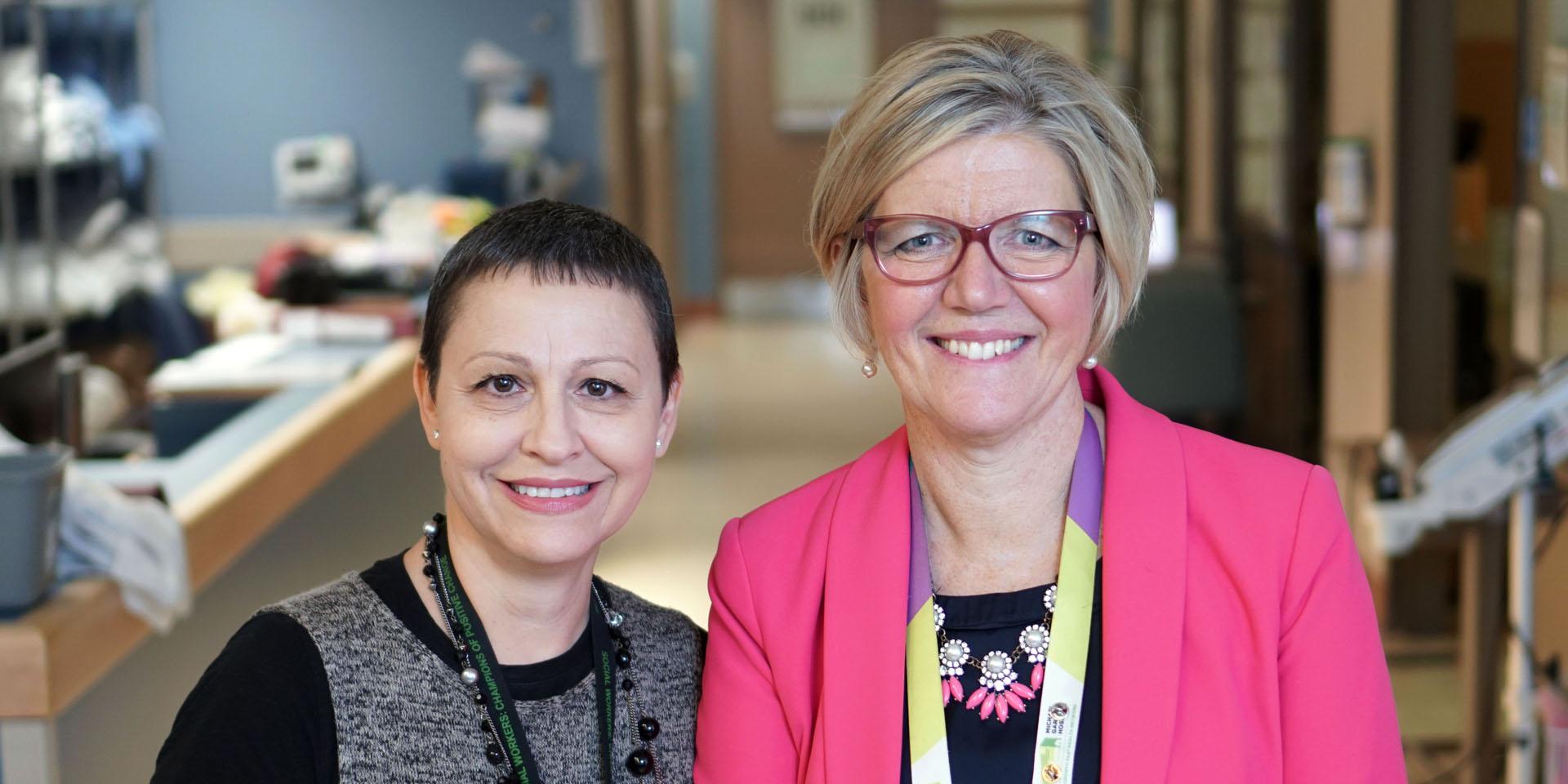 Alina Mustata, recipient of the inaugural MGH Hidden Hero award, with Marilyn Lee, manager, intensive care unit.