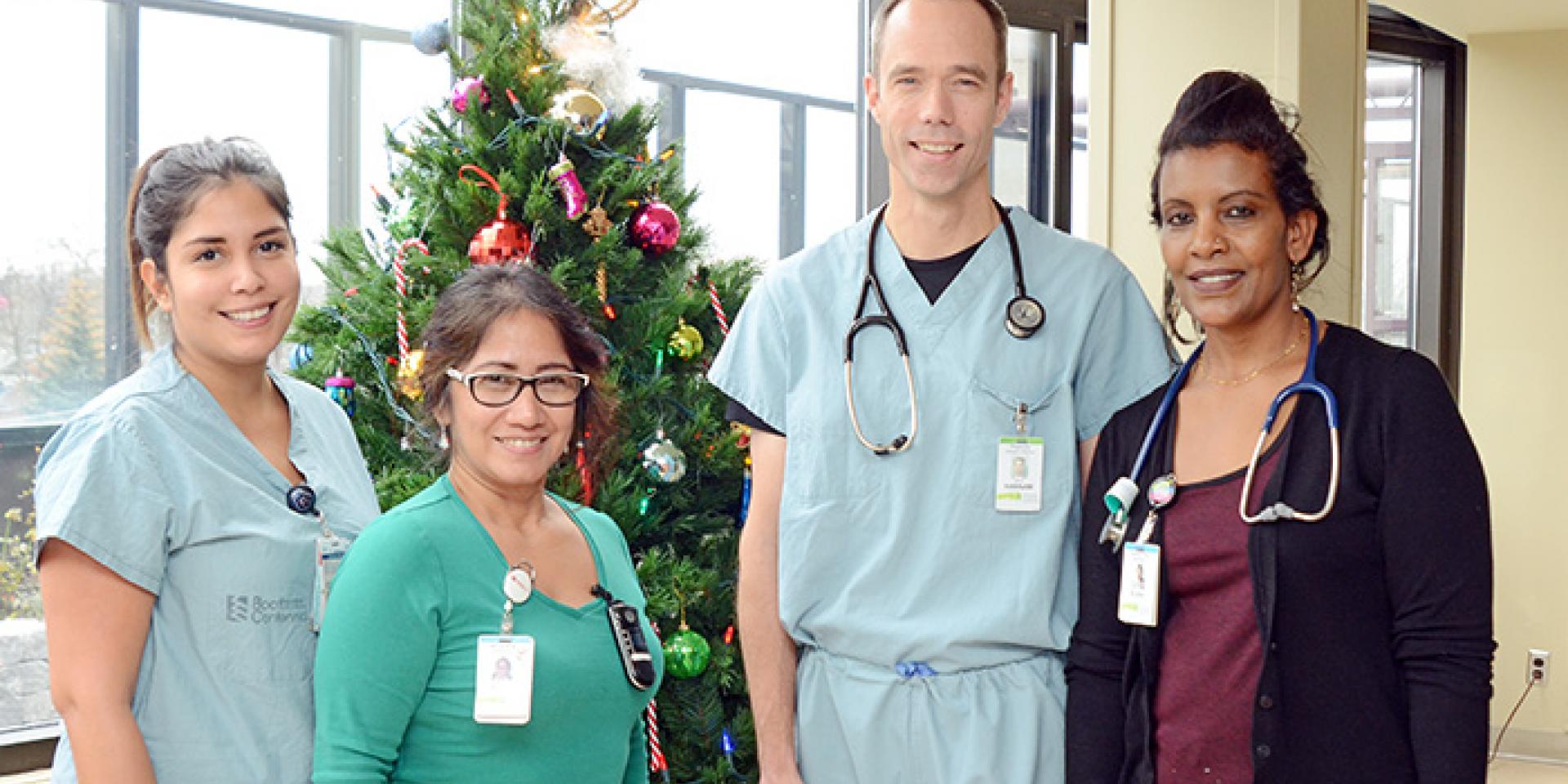 Raquel Gonzalez (RN), Ruby Quiambao (RN), Paul Hannam (MD) and Elsa Asgodom (RN)