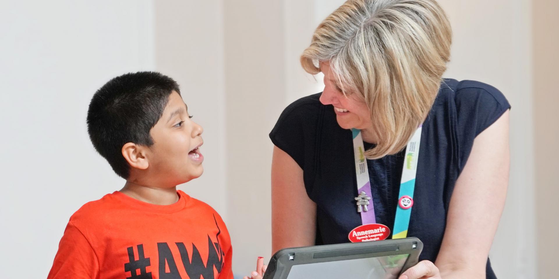 Zain with speech language pathologist Annemarie Weeda.