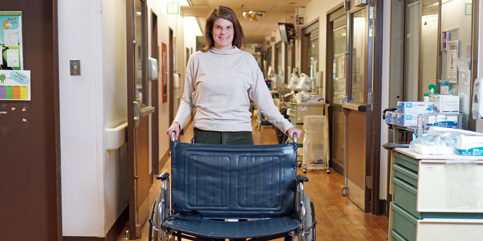 Sarah Bingler with bariatric wheelchair.
