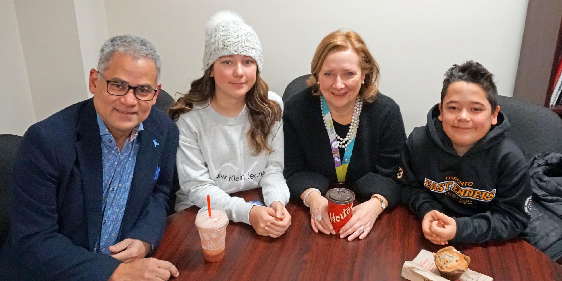 Sarah Downey having breakfast with husband Manfred and children Elise and Joshua