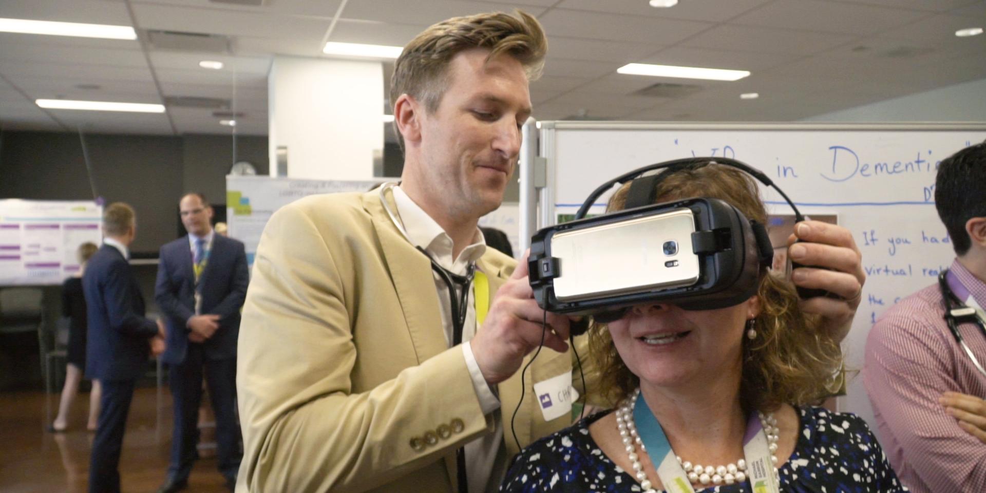 Sarah Downey wearing a virtual reality headset 