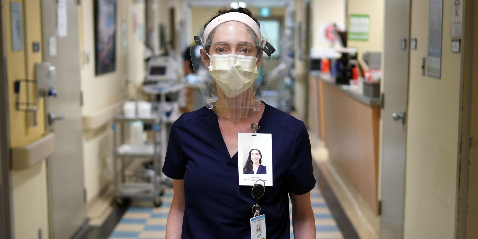 Leah Silber stands in hospital hallway