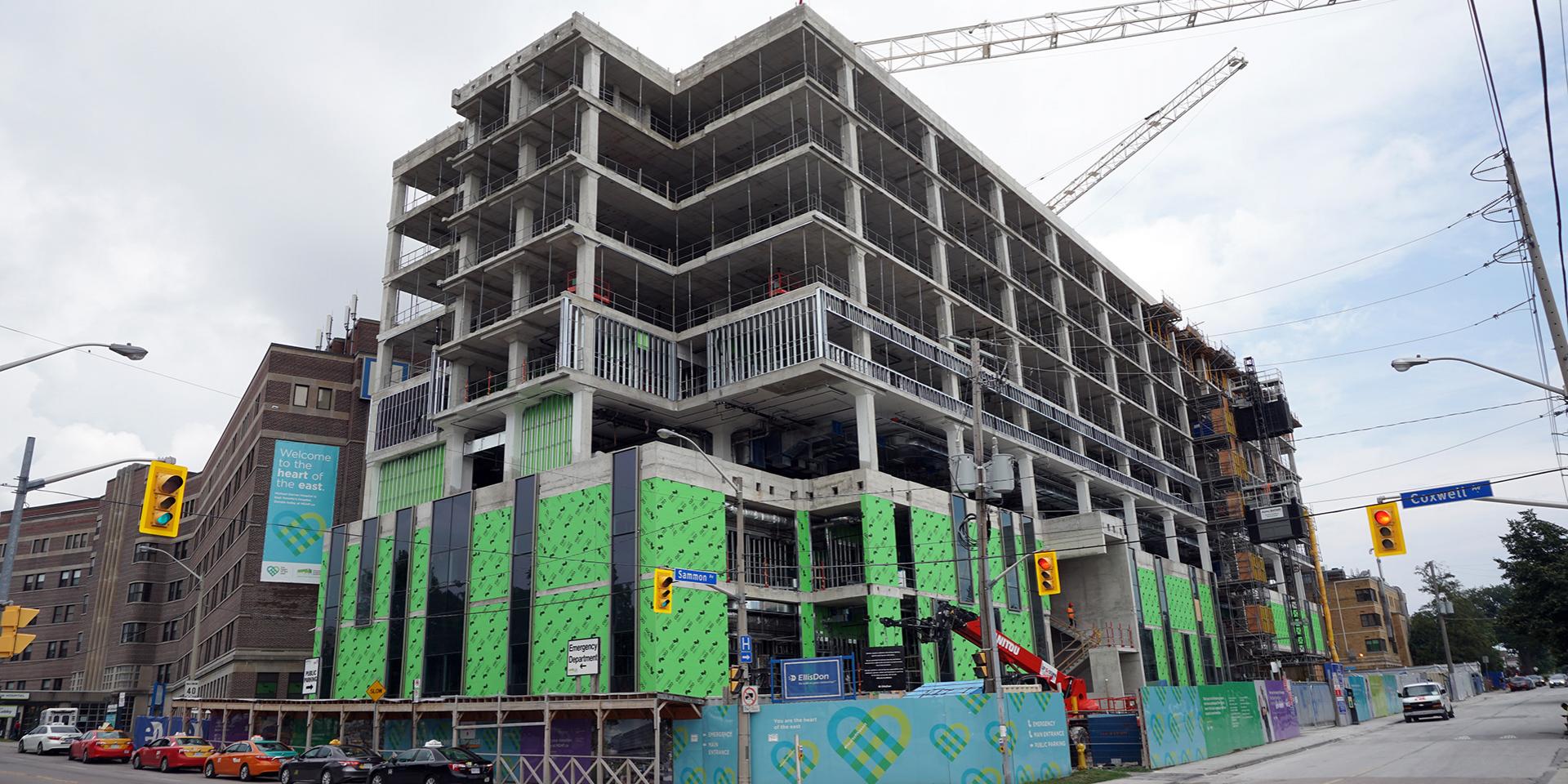 Construction progress at the corner of Coxwell and Sammon Avenues