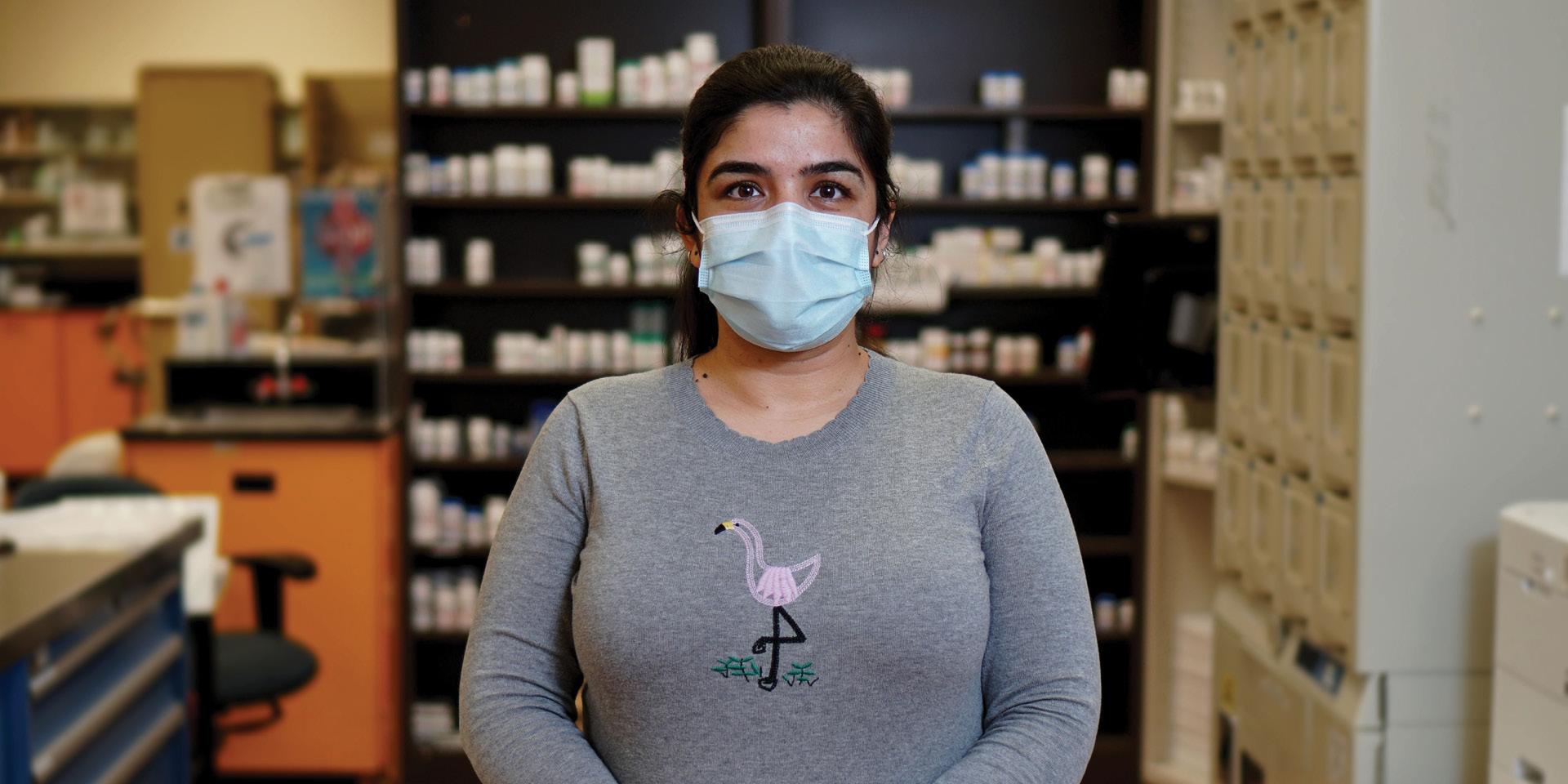 Navjot Kaur standing in MGH's pharmacy department