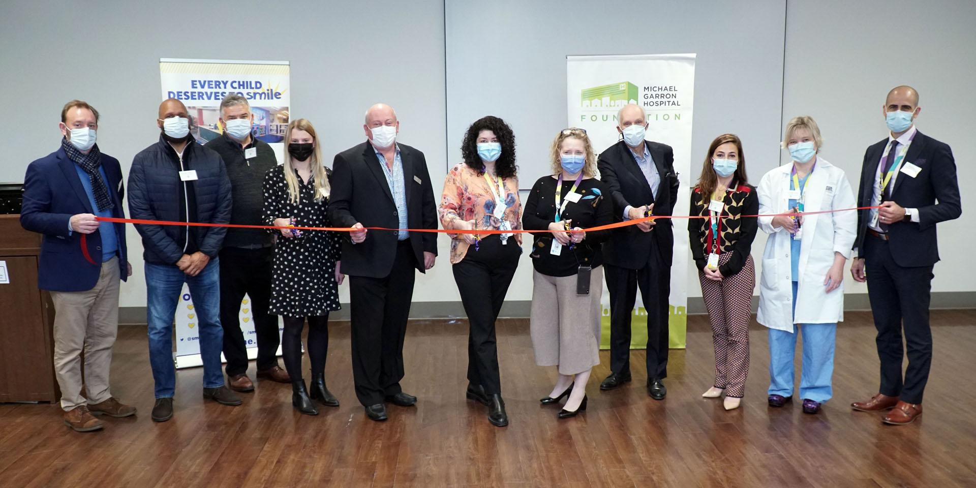 Group shot of ribbon cutting