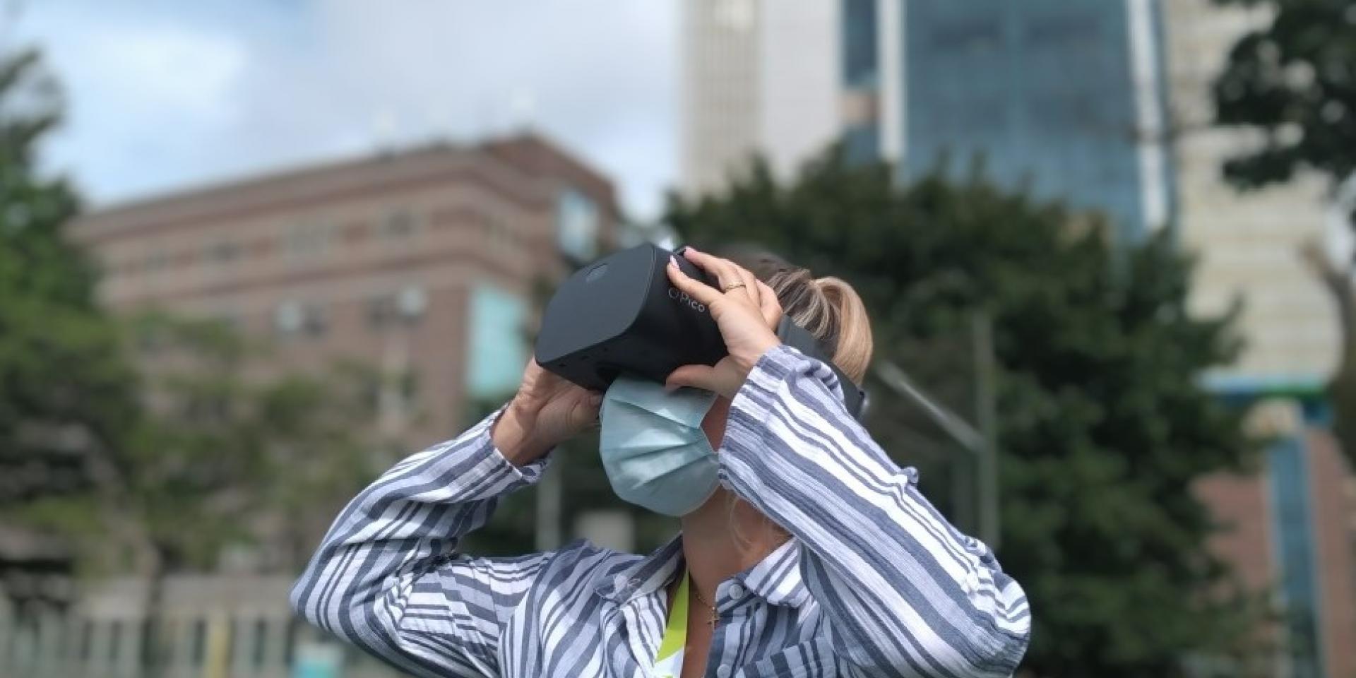 Woman uses virtual reality headset