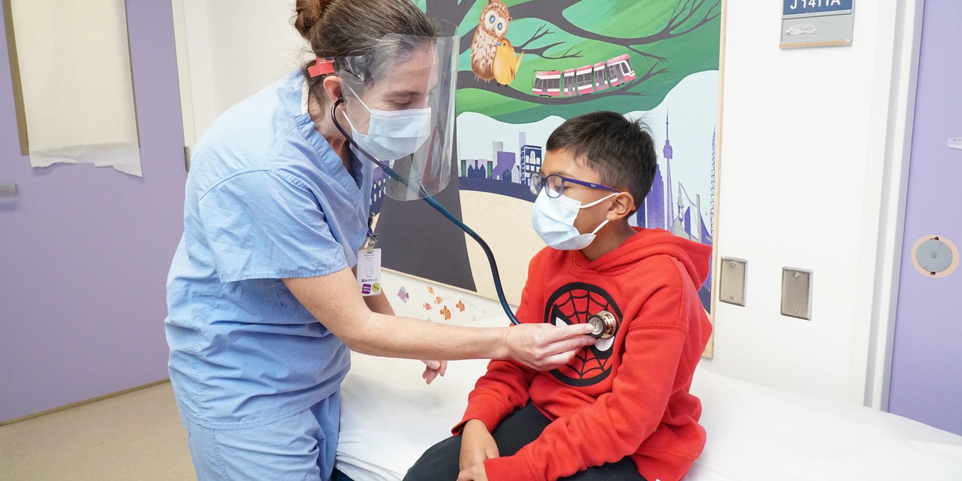 Physician in the Emergency Department helping a child 