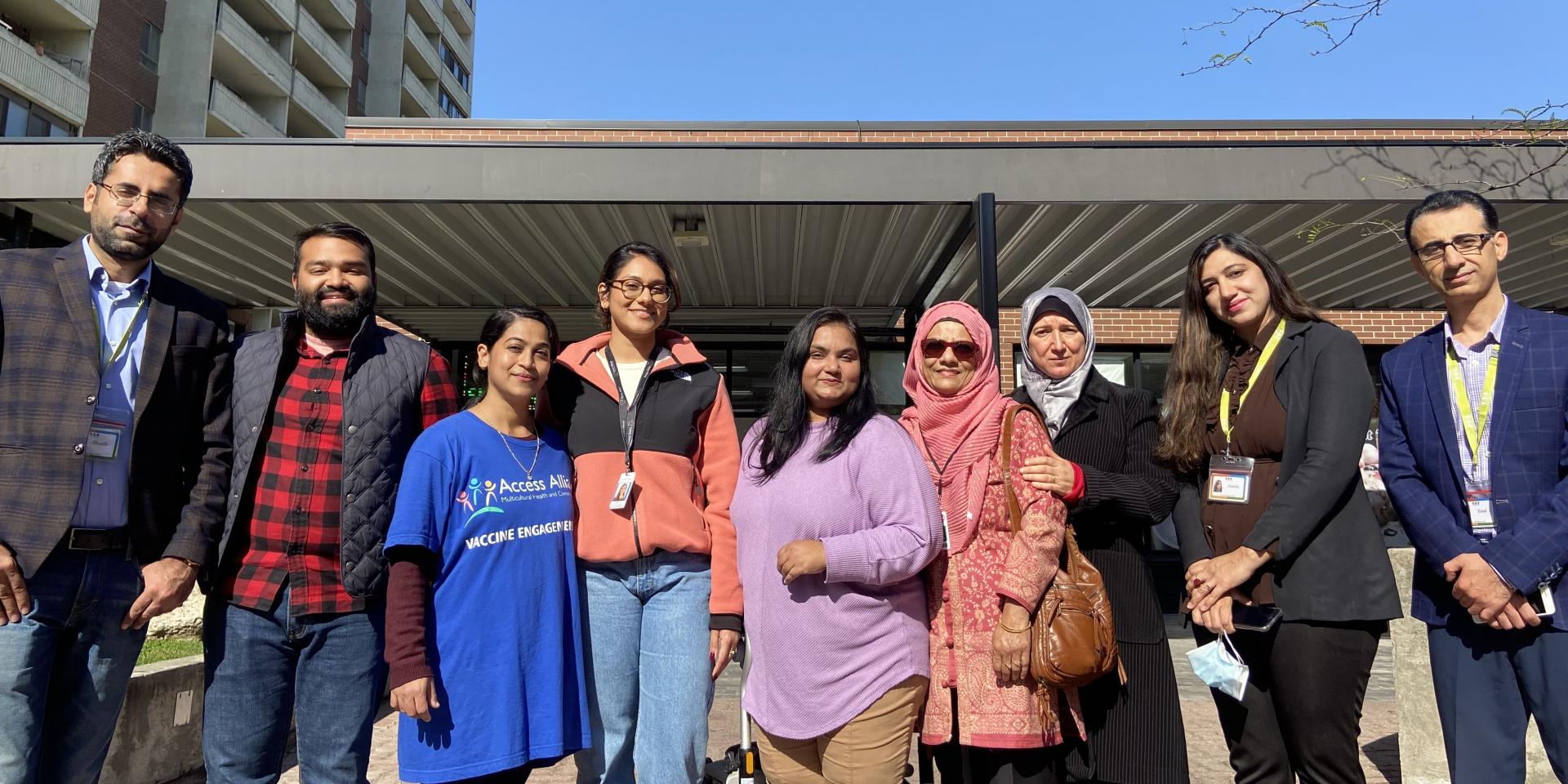 Team members from Health Access Taylor-Massey stand outside smiling.