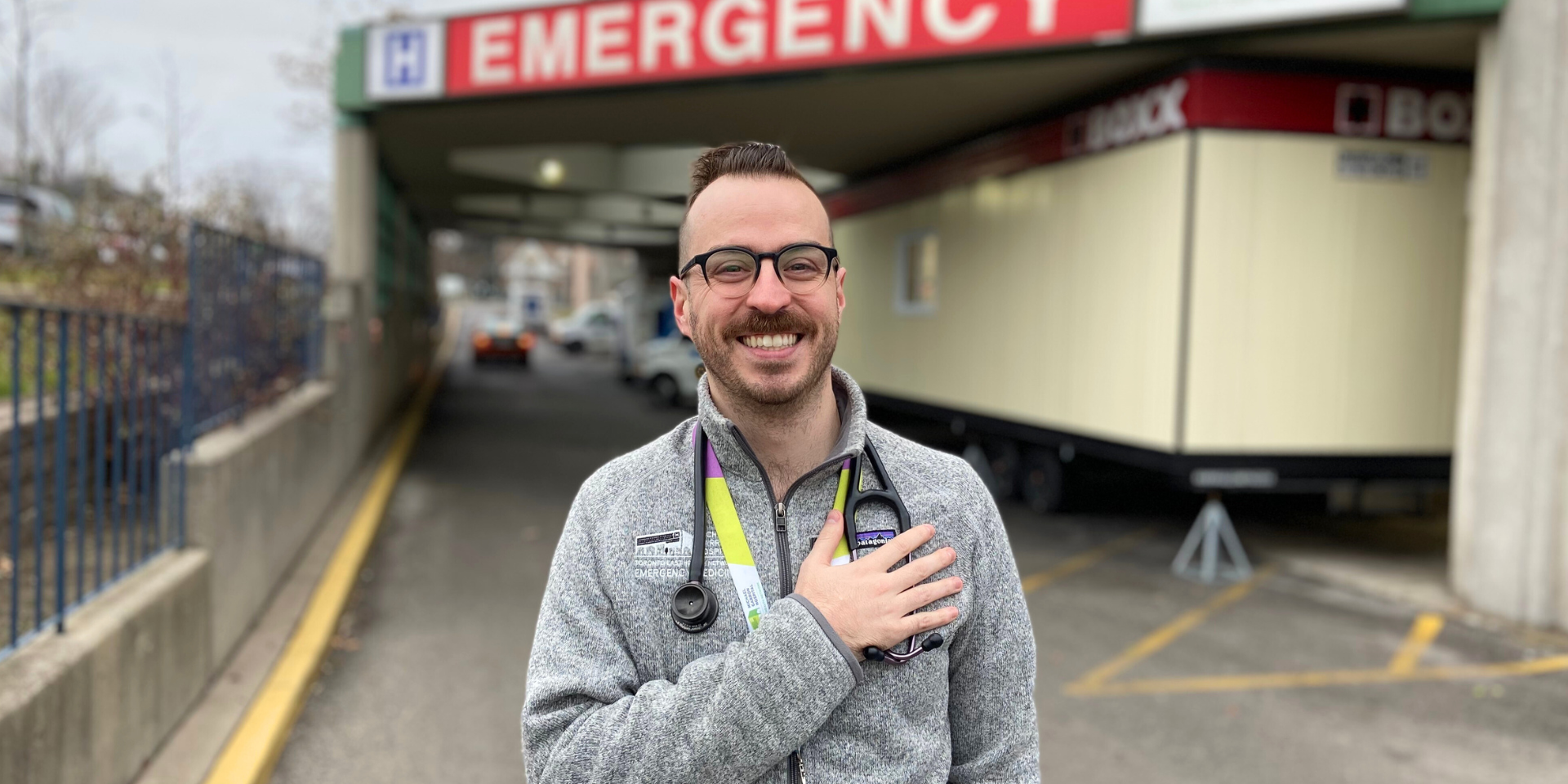 Dr. Jefferson Hayre stands in the ambulance bay of Michael Garron Hospital.