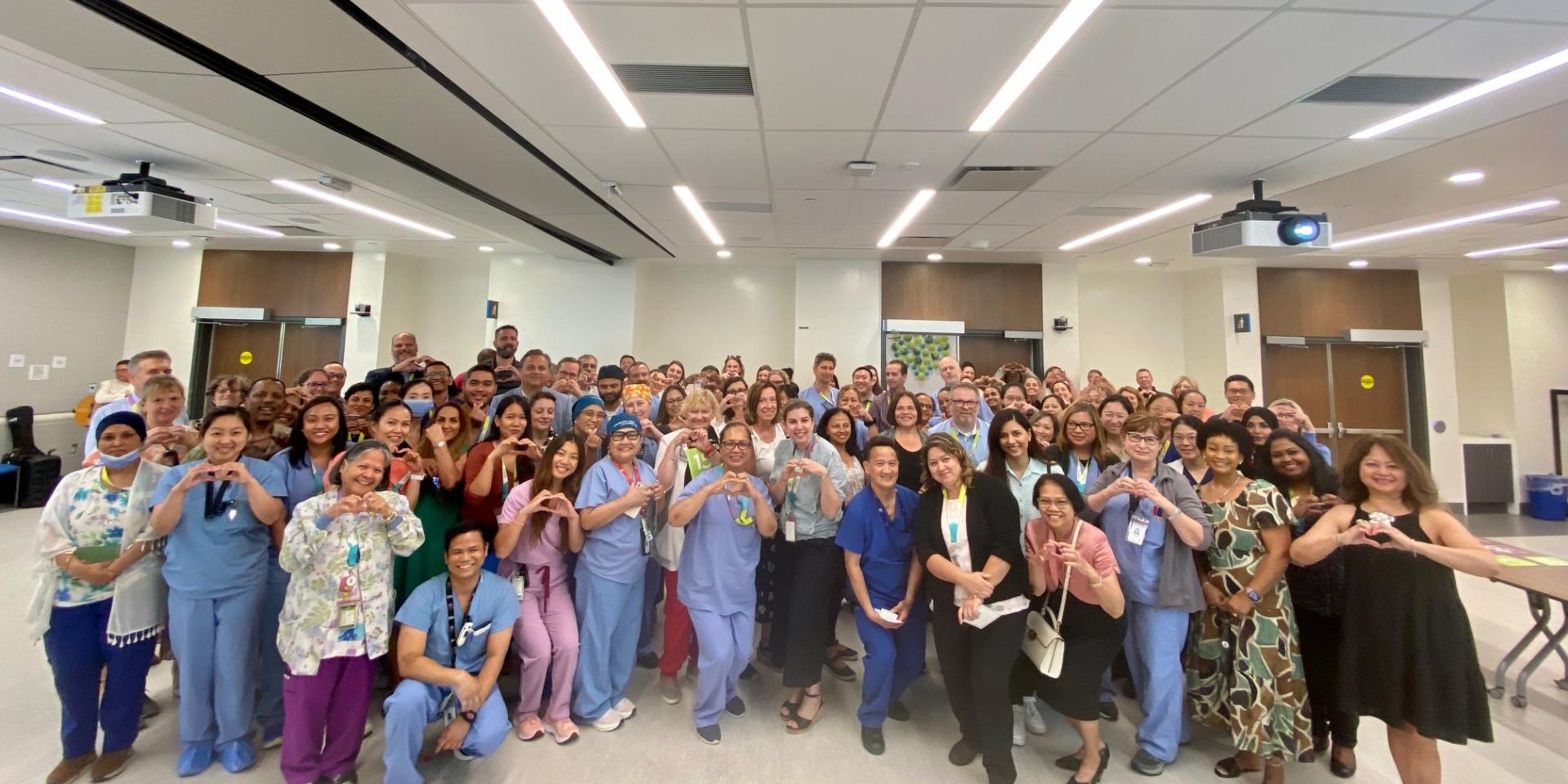 Staff celebrate career milestones at MGH's Long Service Awards Reception on July 9, 2024.