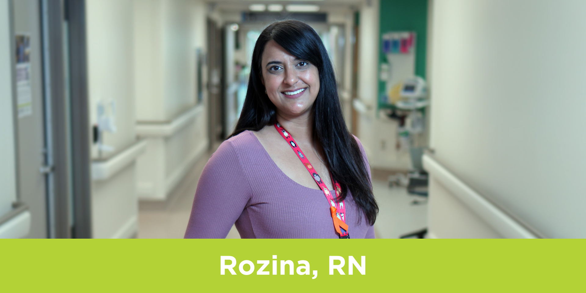 Rozina Ramrattan, Registered Nurse at Michael Garron Hospital, poses in a hallway.