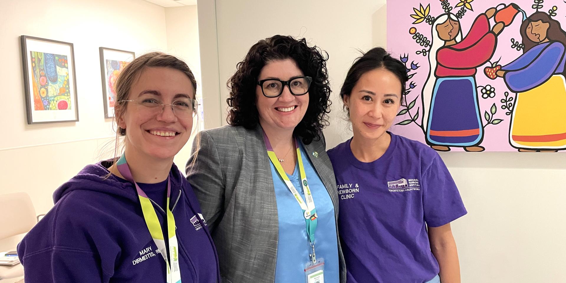 Three midwives pose at Michael Garron Hospital's Family and Newborn Clinic.