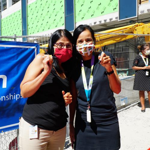 Staff holding markers before signing Unity Beam