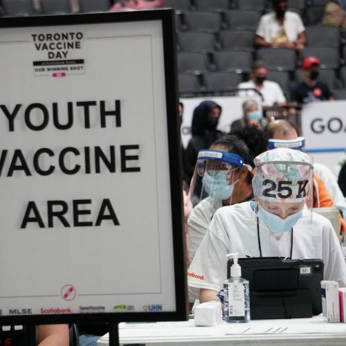 A sign indicates a dedicated youth vaccine area at Scotiabank Arena.