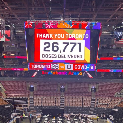 The big screen at Scotiabank arena shows the number 26,771, the number of vaccines administered on Sunday.