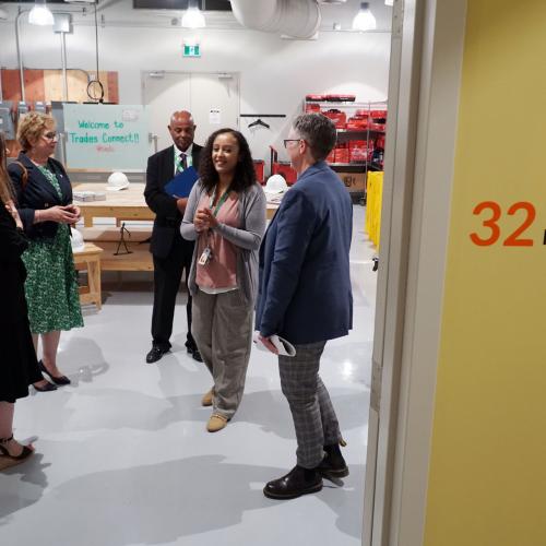 Staff and government representatives receive a tour of the new home of TNO – The Neighbourhood Organization’s Trades Connect Program inside the Thorncliffe Park Youth Wellness Hub.