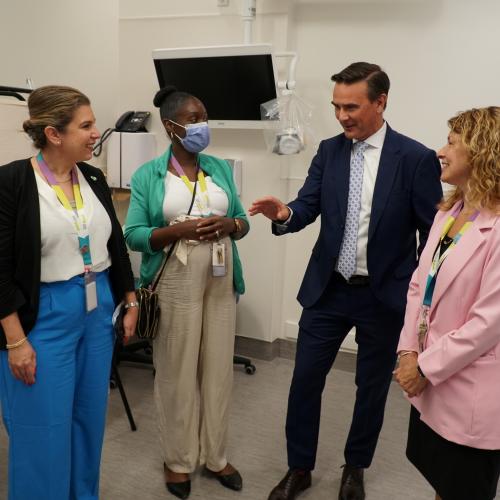 Melanie Kohn with multiple staff members at the grand opening of The Rands Family Simulation Centre in September 2023. 