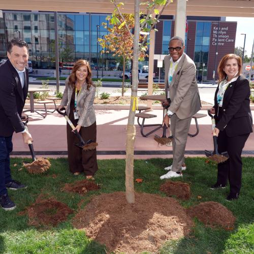 From left: Adrian Rocca, Board Chair, Michael Garron Hospital Foundation; Mitze Mourinho, President, Michael Garron Hospital Foundation; Michael Holder, Board Chair, Michael Garron Hospital; and Melanie Kohn, President and CEO, Michael Garron Hospital at the ceremonial tree planting at the celebration of Coxwell Avenue Opening.