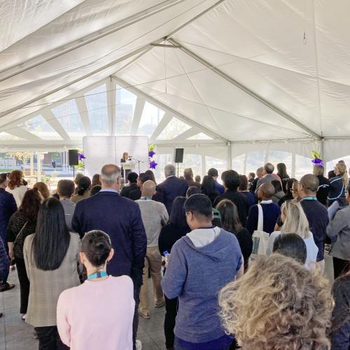 Attendees listen to Melanie Kohn, CEO and President, MGH thank staff, donors, patients, partners and the community for all their hard work over the past eight years of the project. 