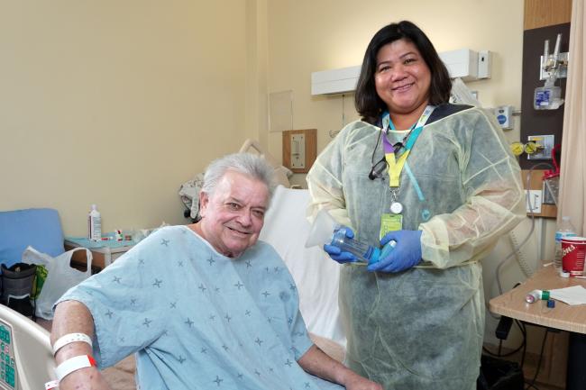 Michael Charles with nurse Tess Macalintal.