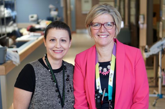 Alina Mustata, recipient of the inaugural MGH Hidden Hero award, with Marilyn Lee, manager, intensive care unit.