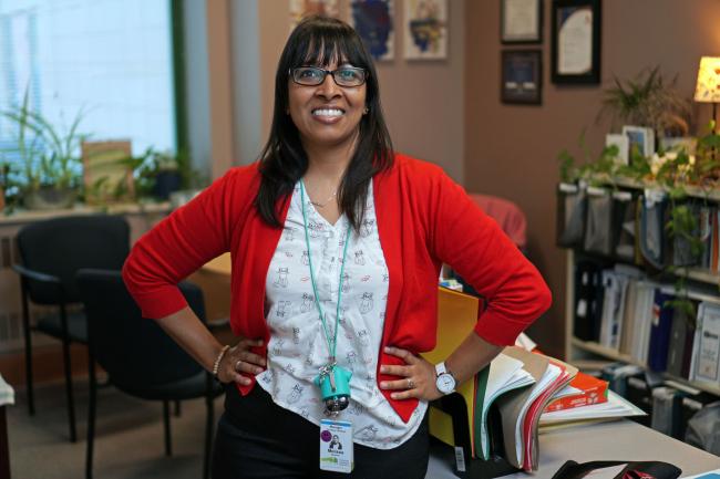 Melissa Samaroo smiling in her office