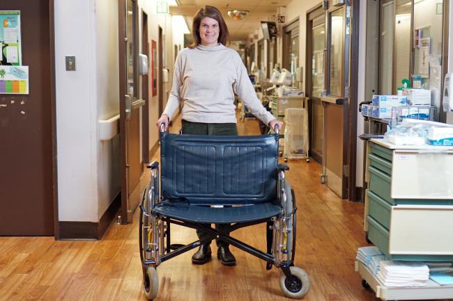 Sarah Bingler with bariatric wheelchair.