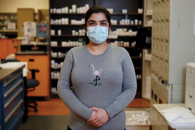 Navjot Kaur standing in MGH's pharmacy department