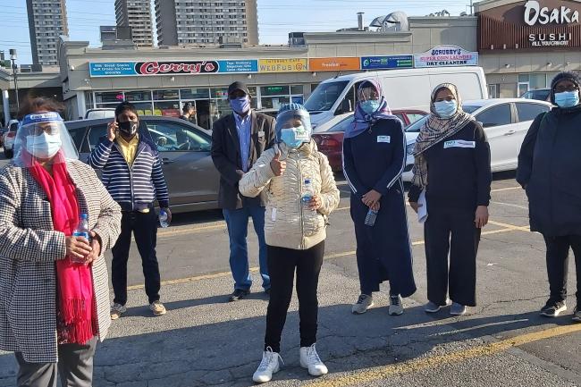 Staff from community organizations in Thorncliffe Park and Flemingdon Park at a pop-up vaccine clinic in the area.