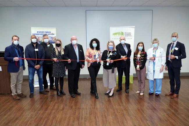 Group shot of ribbon cutting