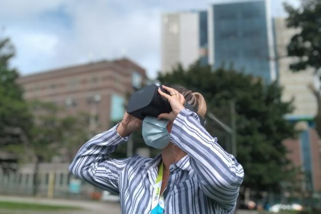 Woman uses virtual reality headset