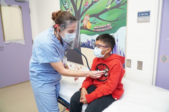 Physician in the Emergency Department helping a child 