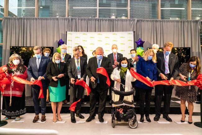 Dignitaries, hospital and foundation representatives, and a patient cut the ceremonial ribbon to mark the celebratory grand opening of Michael Garron Hospital’s new Ken and Marilyn Thomson Patient Care Centre.