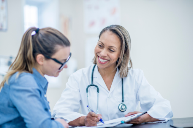 A doctor talks to a patient