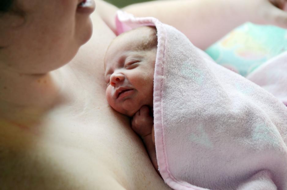 Maternity - Newborn baby sleeping on chest Newborn baby sleeping on parent's chest