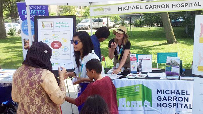 Meena with Lisa Sparrow, RN, at the Thorncliffe Women's Community Bazaar in August.