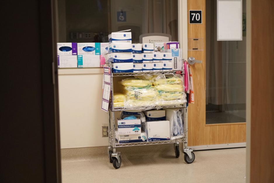 Cart filled with personal protective equipment supplies