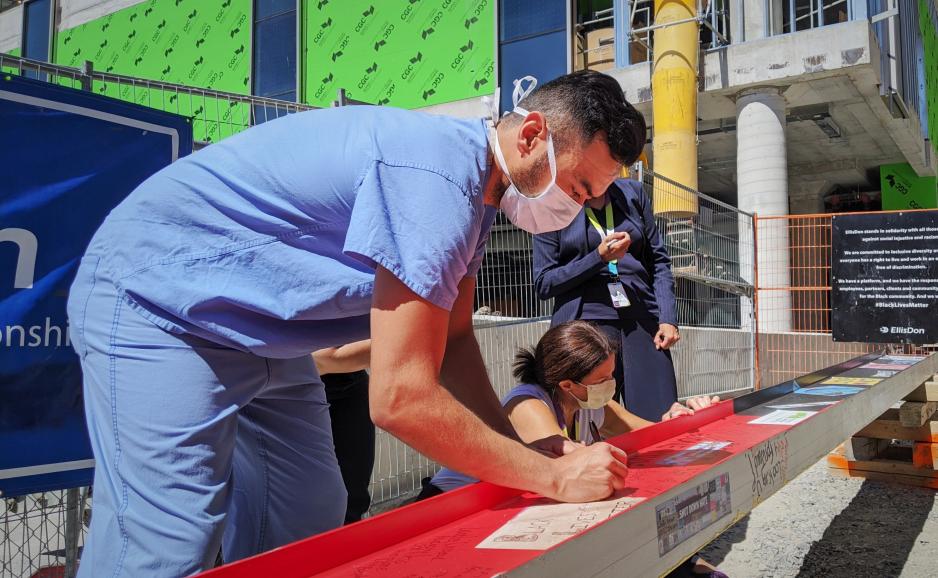 Dr, Abouali signing Unity Beam