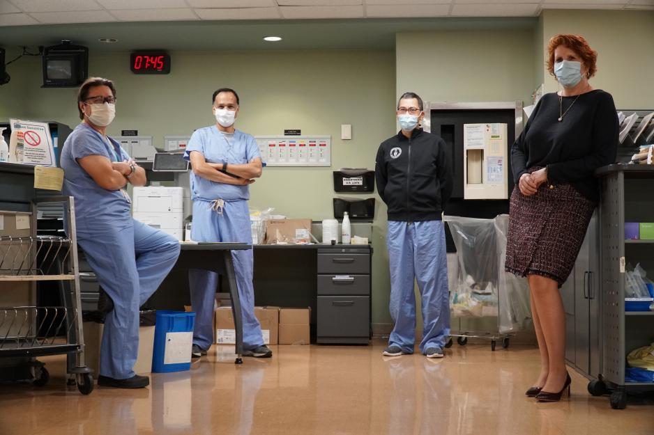 From left, Dr. Carmine Simone, Dr. Rajiv Singal, Dr. Desmond Lam and Jane Harwood