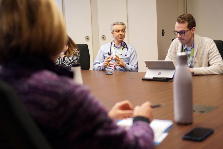 Dr. Jeff Powis leads an emergency preparedness meeting in a conference room at MGH.