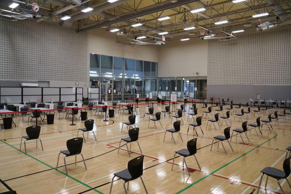 Chairs are arranged two metres apart at a community centre where a COVID-19 Immunization Clinic is being hosted.