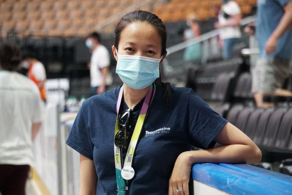 Grace Ho stands in the Scotiabank Arena, the record-breaking clinic that administered more than 26,000 doses in one day