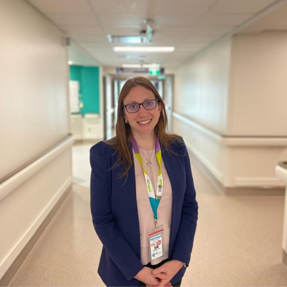 Carolyn Hay, Project Manager of Redevelopment at Michael Garron Hospital, stands in a hallway on the ninth floor of the inpatient unit in the Thomson Centre