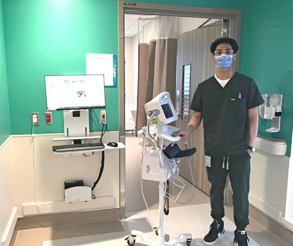 Donn Quiambo, Registered Practical Nurse at MGH, monitoring patients' vitals in the Thomson Centre. 