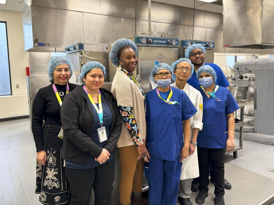 MGH Food Services team standing smiling. 