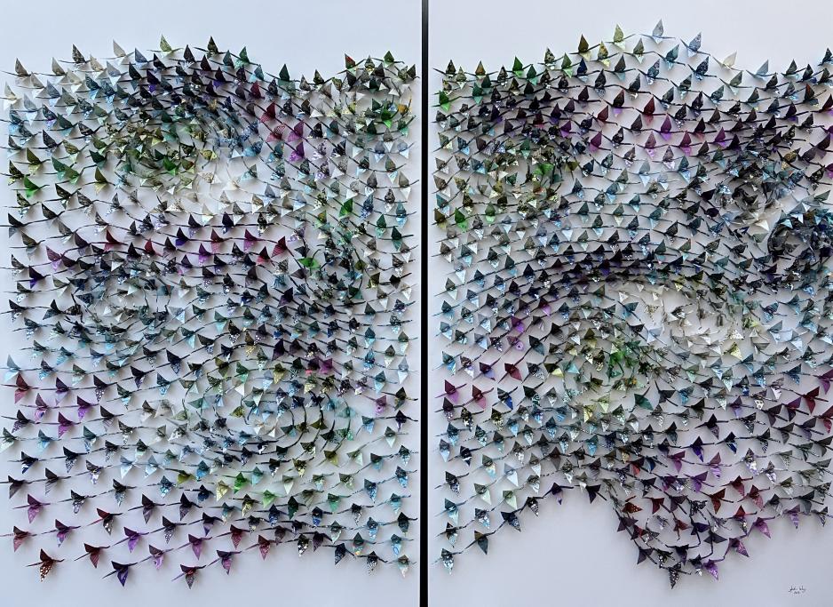 Intricate origami assemblage with 1,000 origami cranes.