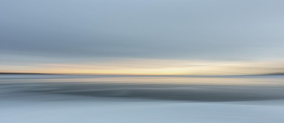 Photograph of water and the horizon.