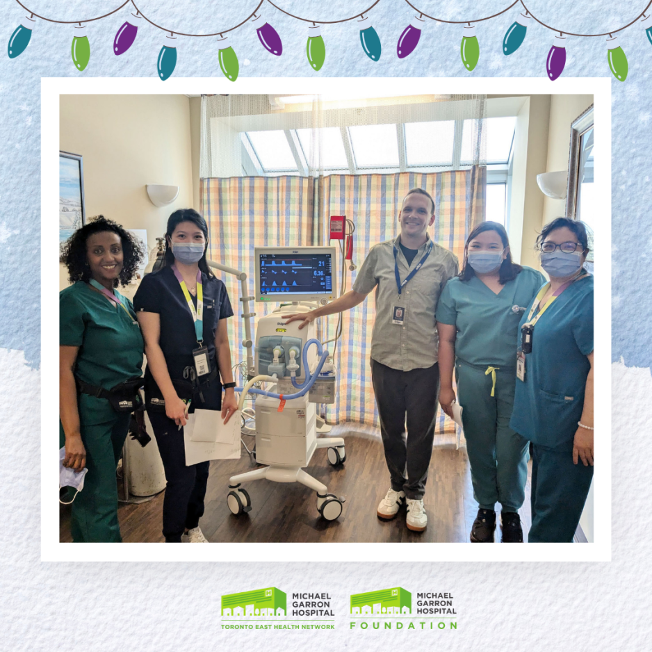 Healthcare professionals standing around a mechanical ventilator.